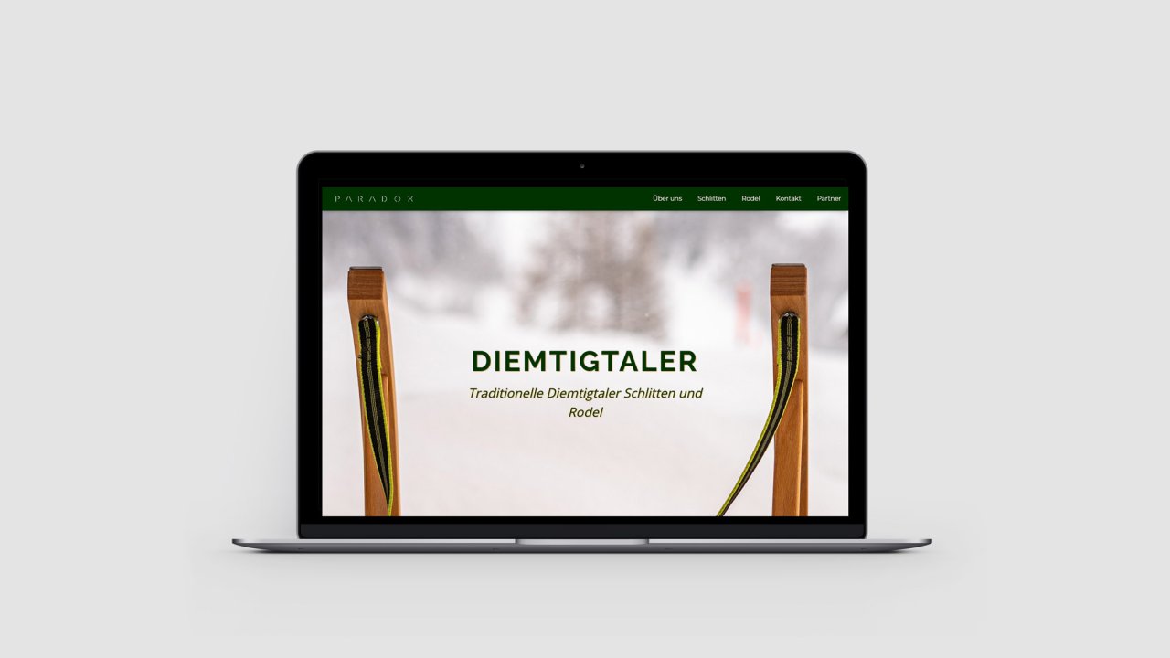Referenz Diemtigtaler Vorschau Webseite Schlitten von PARADOX Möbel Küchen Innenausbau auf Laptop